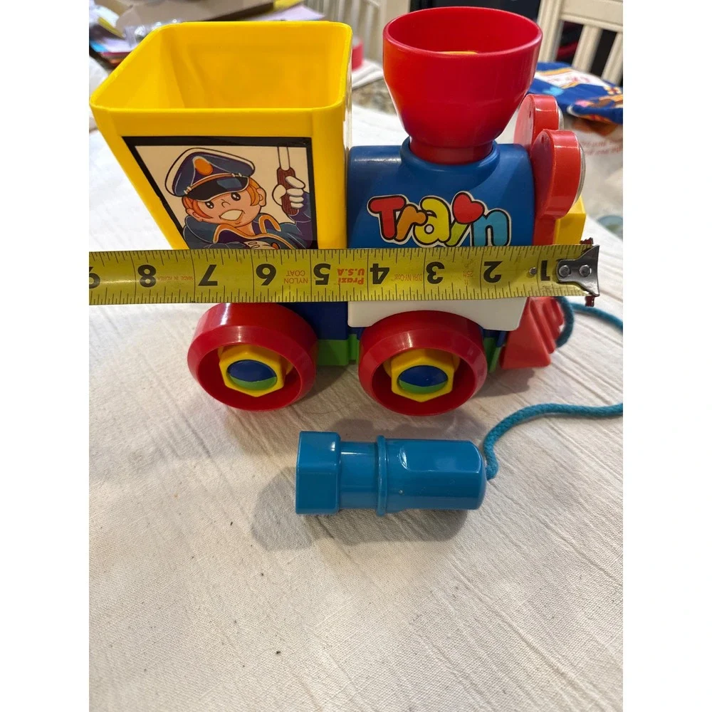 Vintage Take Apart Pull Along Toy Train with Wrench Tool Colors Conductor